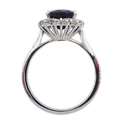18ct white gold oval sapphire and diamond cluster ring, hallmarked, sapphire approx 3.65 carat, total diamond weight approx 3.65 carat, total diamond weight approx 0.55 carat