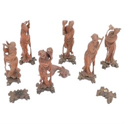 Collection of Chinese carving including a Shubunkin and various immortals 