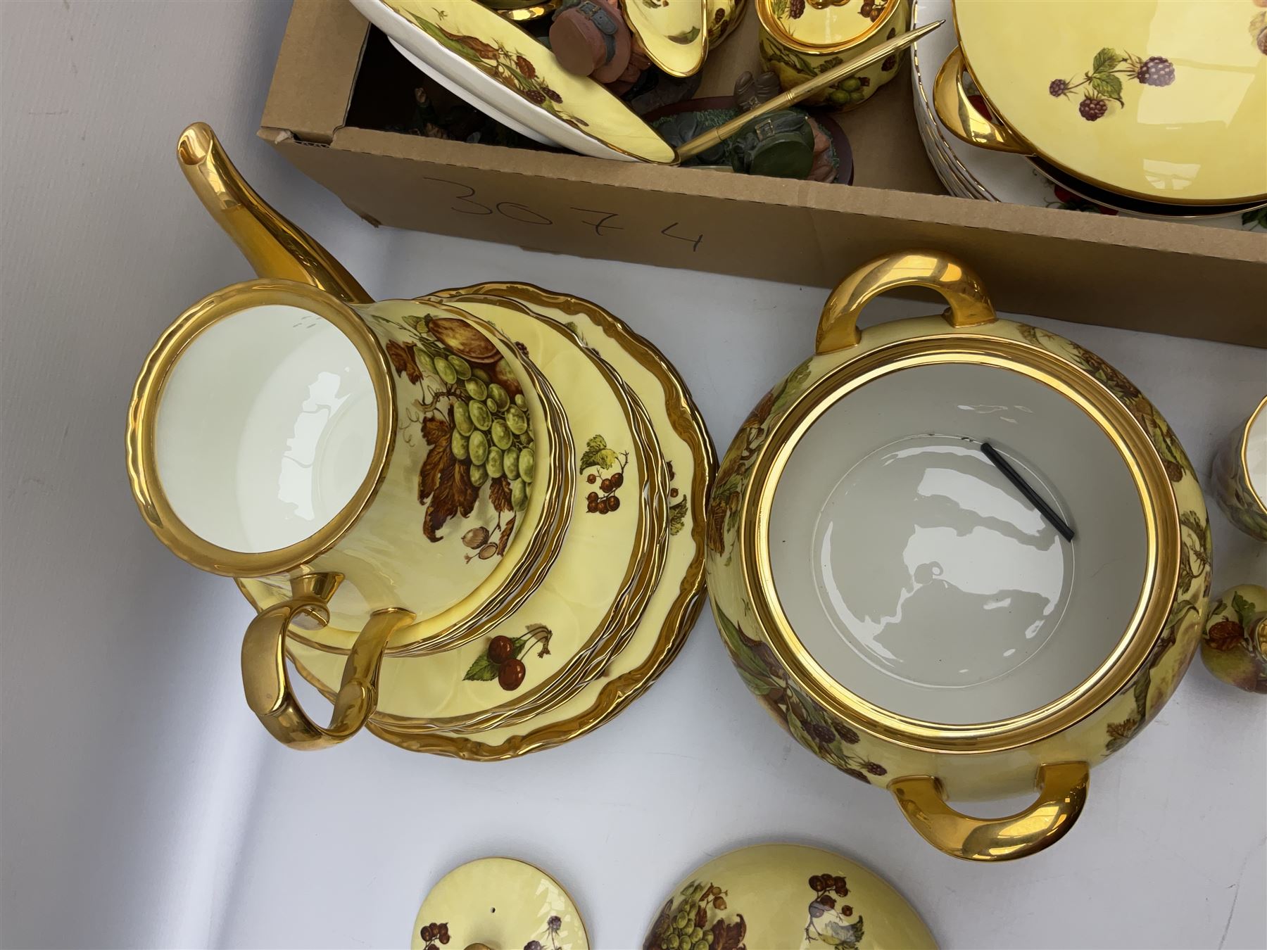 Canterbury tea and dinner service decorated with fruit on a yellow ground with gilt detail, together with Baroness tea service and other ceramics and collectables, in three boxes