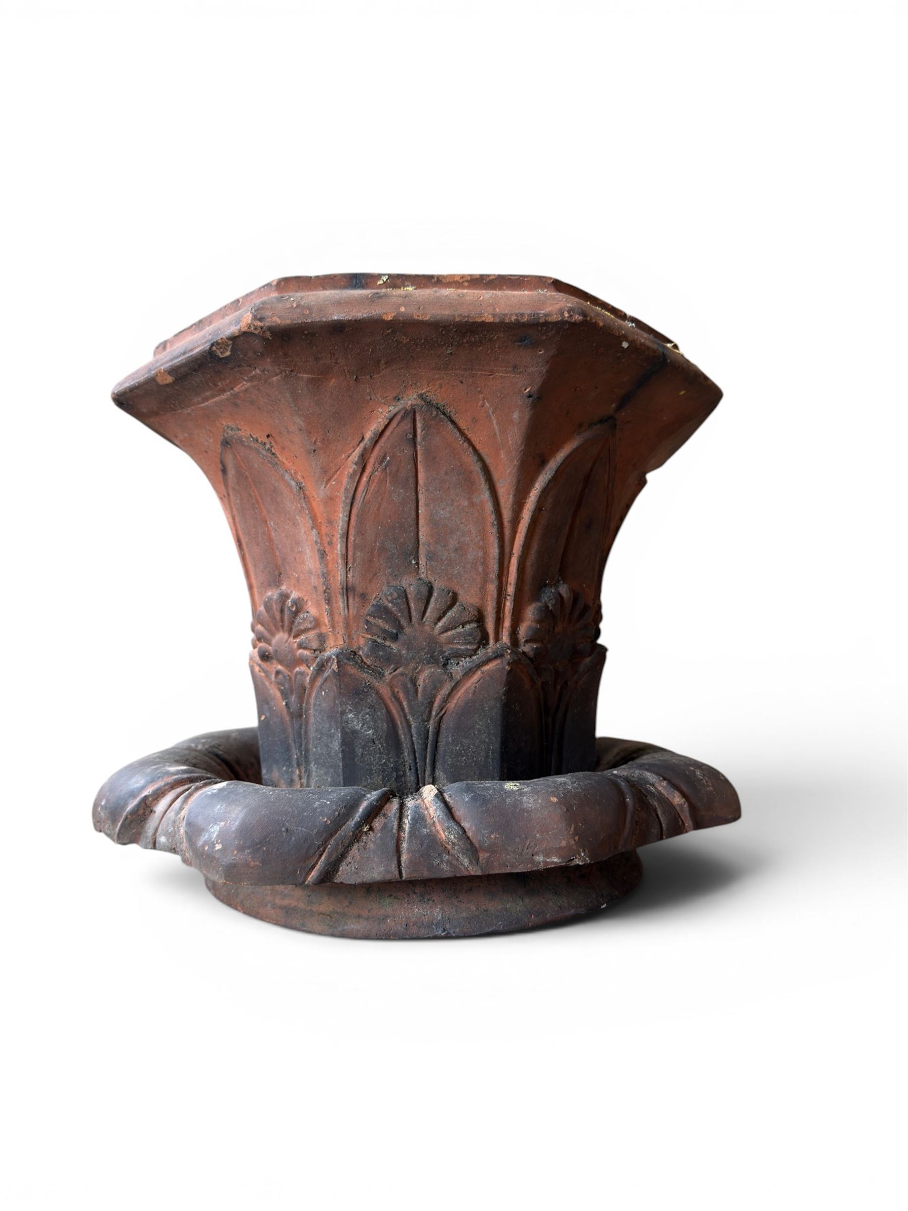 Small 19th century terracotta octagonal planter with stand, flower and leaf design