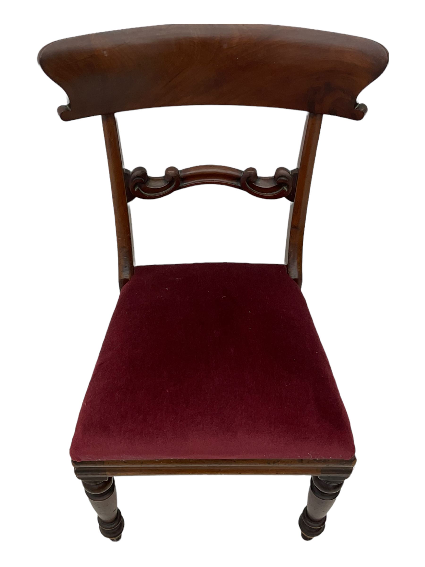 Seven early 19th century mahogany dining chairs - set six side chairs with scroll carved middle rails (W46cm), and a carver elbow chair with rope twist middle rail