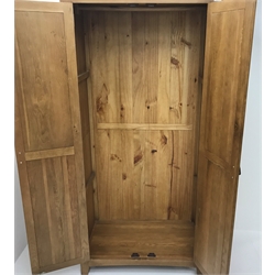  Modern oak double wardrobe, projecting cornice, two doors enclosing hanging rail, stile supports, W90cm, H184cm, D52cm  