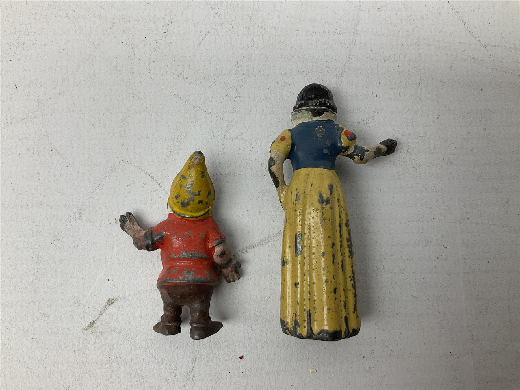 Collection of twenty-two Britains Cadbury's Cococubs play worn lead painted figures to include Mr Pie Porker, Mrs Pie Porker, Tiny Tusks, Captain Kangaroo, Granny Owl and others, Britains Snow White and Doc lead figures and other painted lead figures (30)