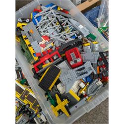 Large collection of Lego, including partially built vehicles, Police Station, Lego Creator 31010 and a collection of Lego instruction booklets