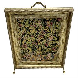 Late 20th century fire screen, moulded silvered frame enclosing needlework panel