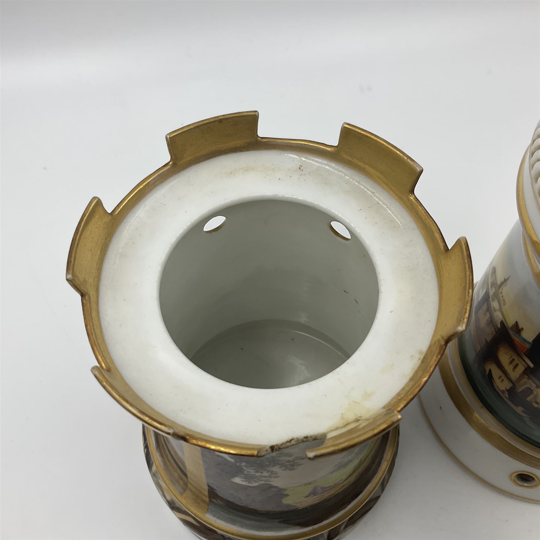 Two 19th century continental teapots and warmers, each teapot upon a cylindrical warming base, hand printed with seascapes, largest H22cm 