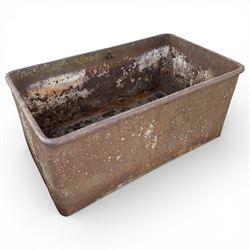 Cast iron Planter / trough along with three cast stone planters