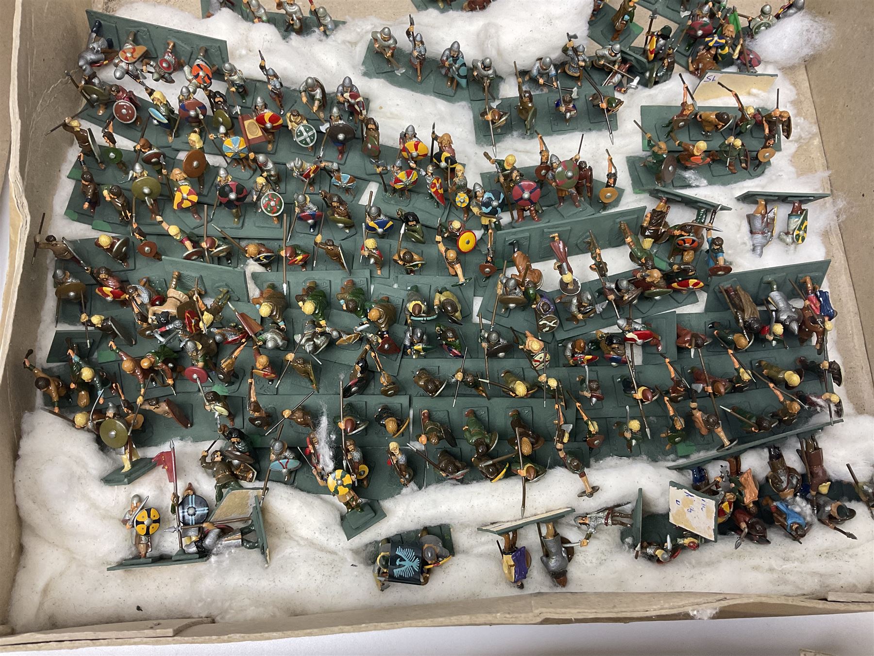 Painted metal wargame figures - over four hundred including Normans and Saxons, Romans, British Tribes etc; together with a quantity of part-painted and unpainted figures, battlefield weapons and accessories etc; average size 25mm