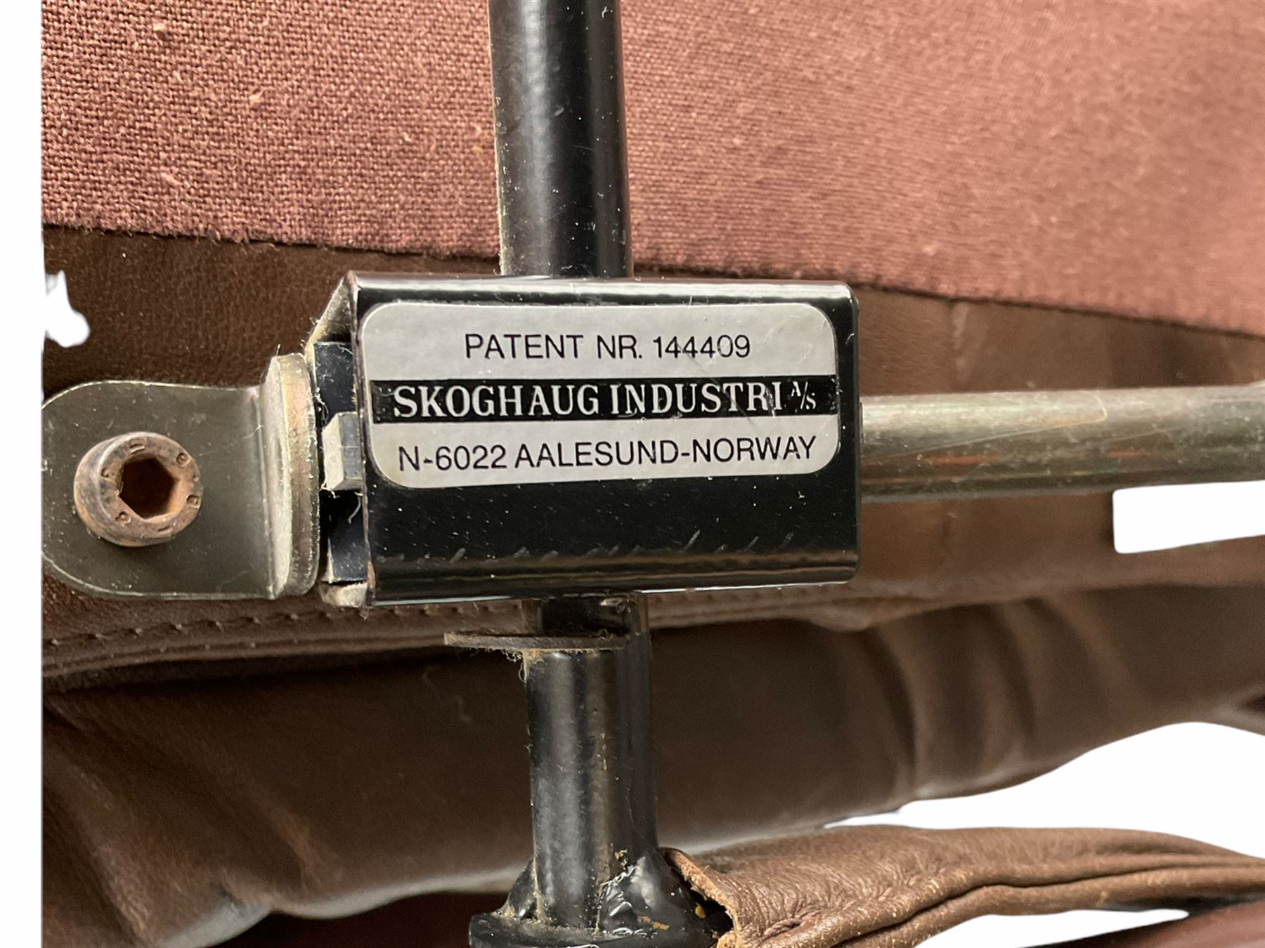 Skoghaug Industries - Leather reclining swivel armchair and matching footstool