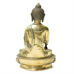 Late 19th/early 20th century brass Buddha in lotus position holding a 'singing' bowl H21cm