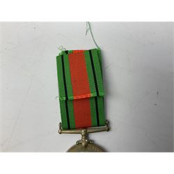 WW1 group of three medals comprising British War Medal and Victory Medal in issue box and Ceylon Volunteer Service Medal awarded to 10288 Pte. M. Smith R. Fus.; together with a later awarded WW2 Defence Medal in modern box with slip; and his QEII Imperial Service Medal in case and box with certificate dated 1959