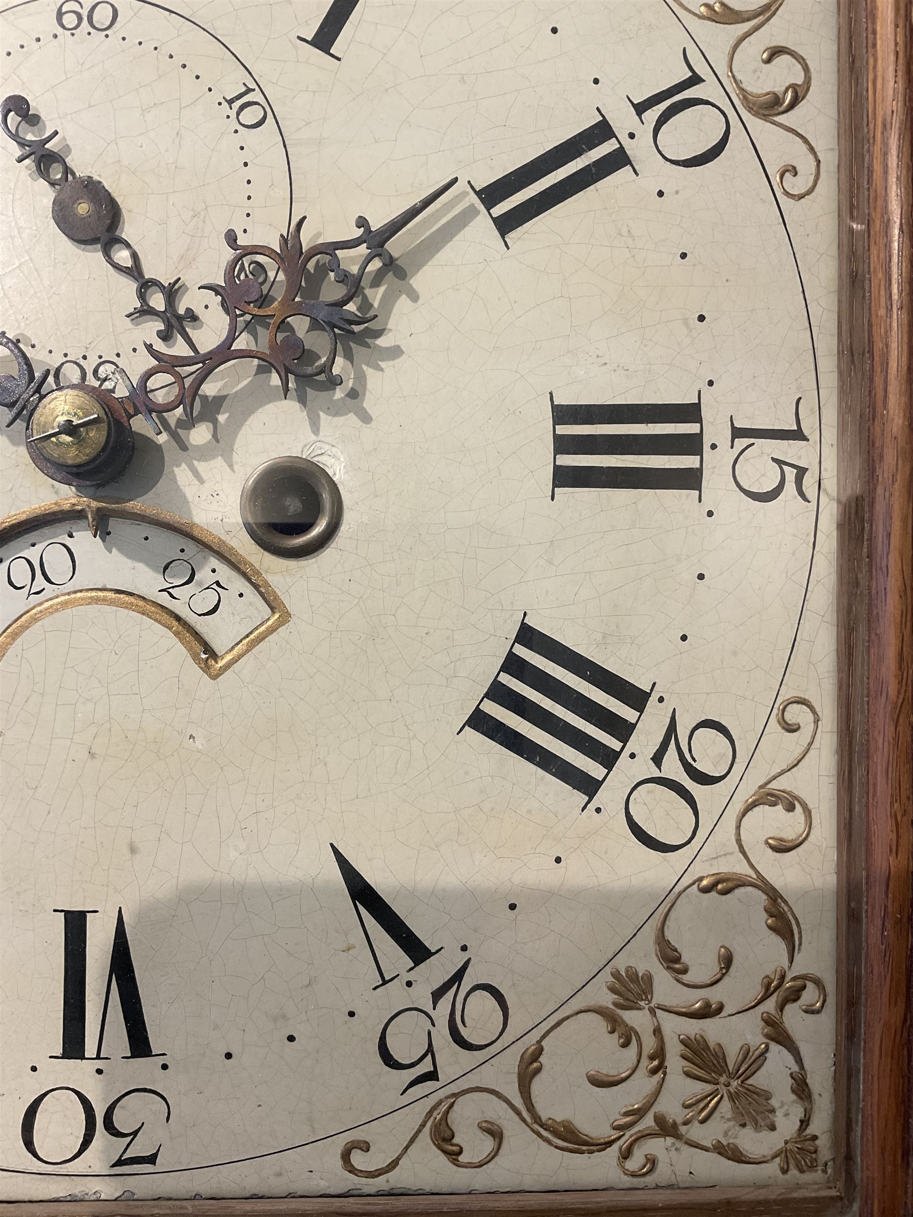 John Sculcoates Branson of Hull - Oak cased 8-day longcase clock c1790, with an inlaid perogda pediment and three ball and spire finials, breakarch hood door beneath flanked by reeded pilasters and brass capitals, long trunk with conforming door on a rectangular plinth raised on a base with bracket feet, early painted dial with raised gesso spandrels, swag cartouche and makers name to the arch, with pierced steel hands, Roman numerals,five minute arabics, seconds dial and calendar aperture, dial pinned via a false plate to a rack striking movement with a recoil anchor escapement. With weights, pendulum and key.