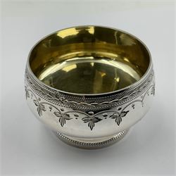 Set of six Victorian silver open salts, each of squat goblet form with gilt interior, engraved with foliate bands, upon stepped circular base, with six matching salt spoons with gilt bowls, all hallmarked Thomas White, London 1881, 1882 and 1884, contained within a hexagonal tooled leather, silk and velvet lined fitted case, salts H3.8cm