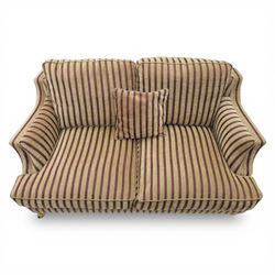 Late 20th century fabric upholstered sofa, with loose back and seat cushions, broad padded arms with piped borders, upholstered in striped textile, raised on concealed feet