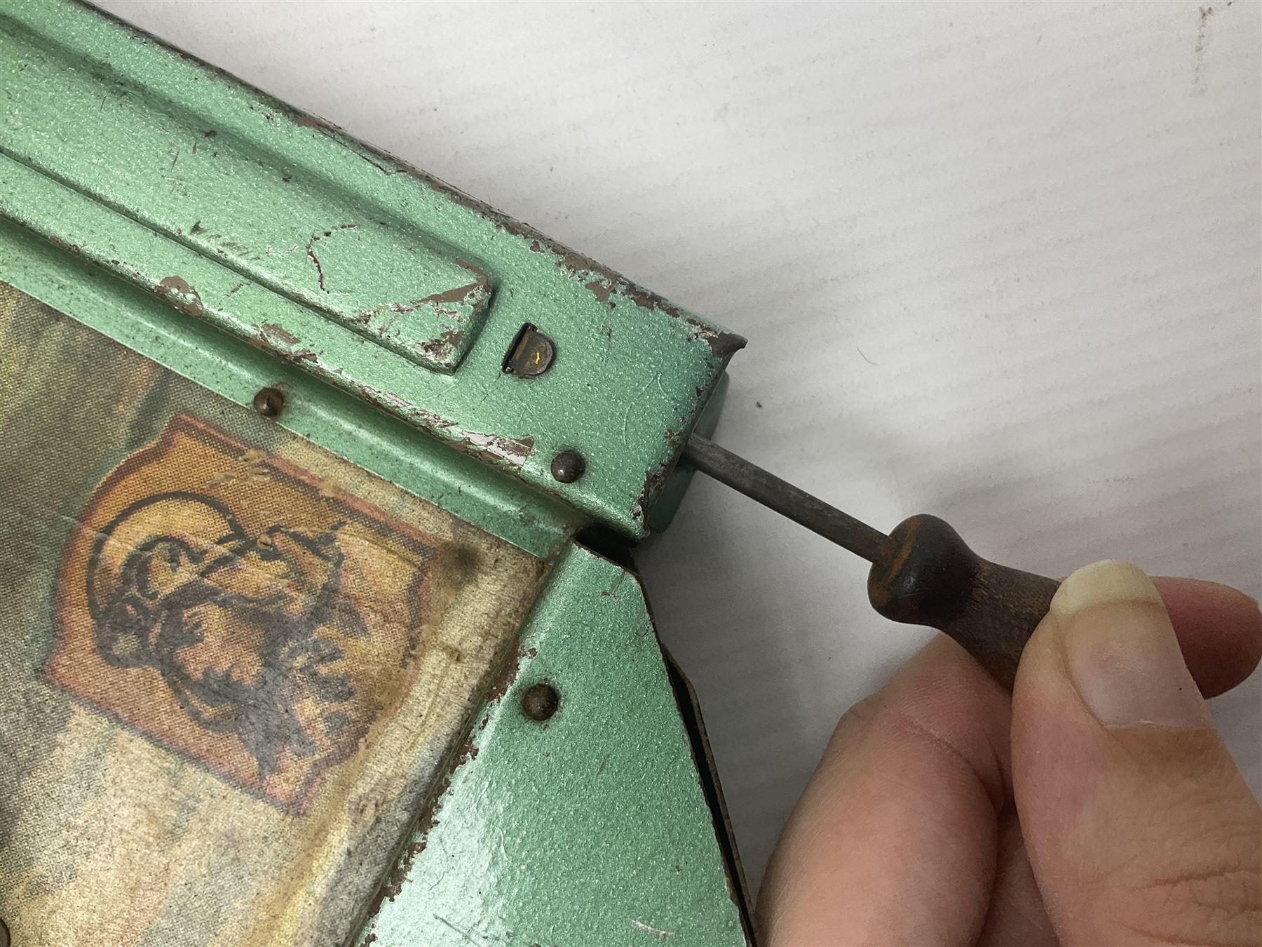 1934 Lindstrom's 'Airways' tin-plate bagatelle game by Lindstrom Tool and Toy Company Bridgeport Conn., the decorative bagatelle board depicting Lindstrom's epic airway routes; with wooden peg and quantity of balls H61cm