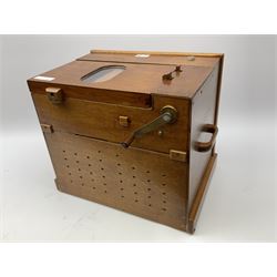 Small scratch built wooden John Smith style twenty-note busker organ with thirteen paper music rolls, other paper music and soft toy monkey