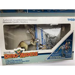Dino-Riders 1980s by Tyco Action-GT, Stegosaurus with Tark and Vega Heroic Dino-Riders; Triceratops with Hammerhead and Sidewinder Evil Rulon Warriors; and Struthiomimus with Nimbus Heroic Dino-Rider; all boxed; two Action Figures, re-bagged on original card backing; and two VHS video tapes (6)