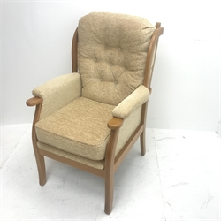 Beevers beech framed high seat armchair, upholstered in a seep buttoned beige fabric, W68cm