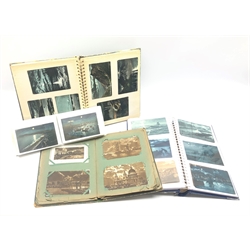  Four albums containing over three-hundred and thirty early 20th century moonlit topographical postcards for Yorkshire, London, Canada and USA etc. From the collection of the late Leslie Benson.  