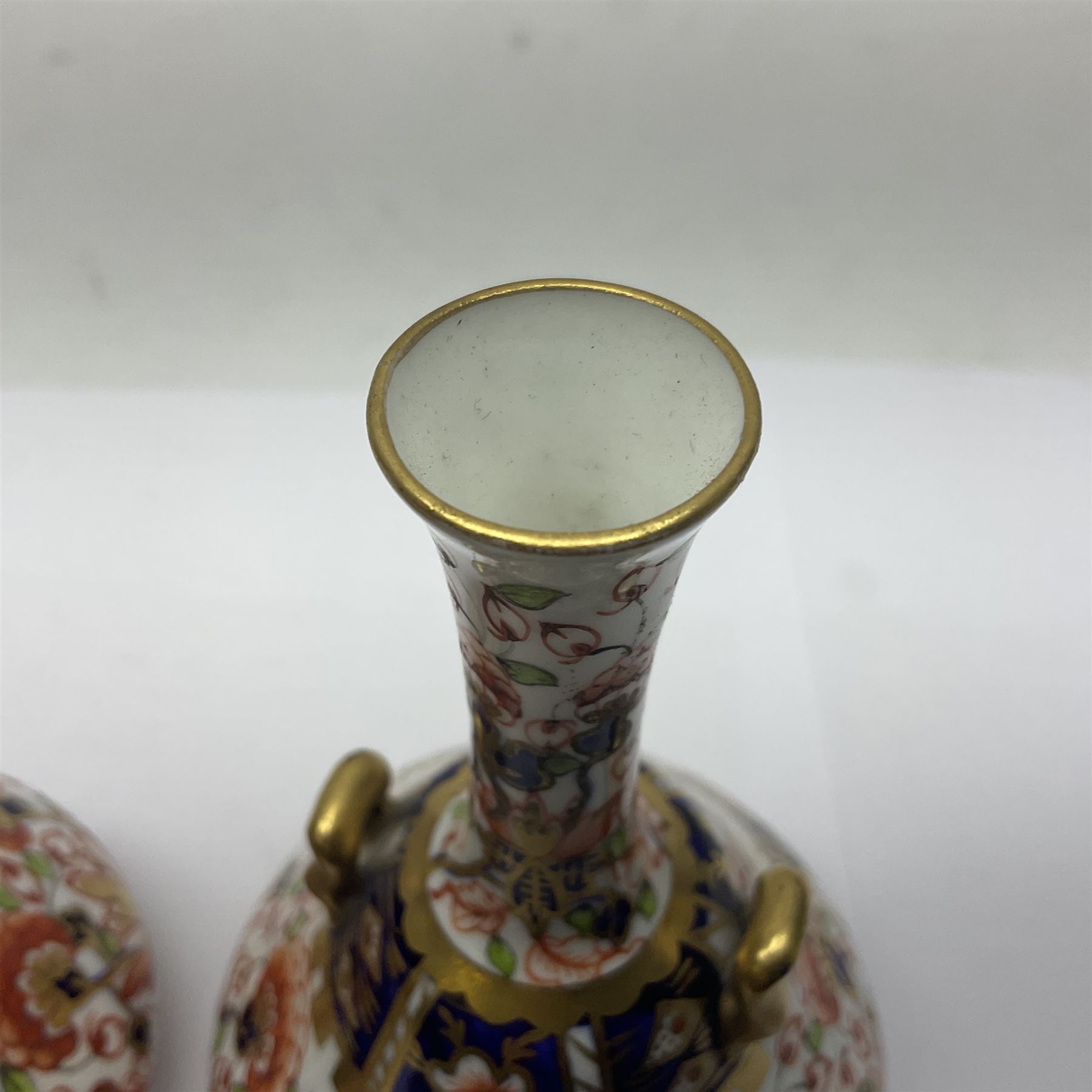 Pair of Royal Crown Derby 6299 imari pattern miniature vases, together with a miniature pitcher and dish in 2451 imari pattern, all with printed marks beneath, vase H12cm 