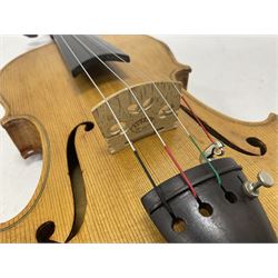 Copy of a full size Stradivarius violin, with an ebonised fingerboard, tailpiece and tuning pegs Length 60cm