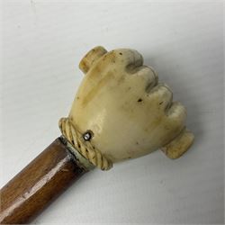 19th century malacca walking cane with scrimshaw handled in the form of a clenched fist holding a scroll, H86cm 