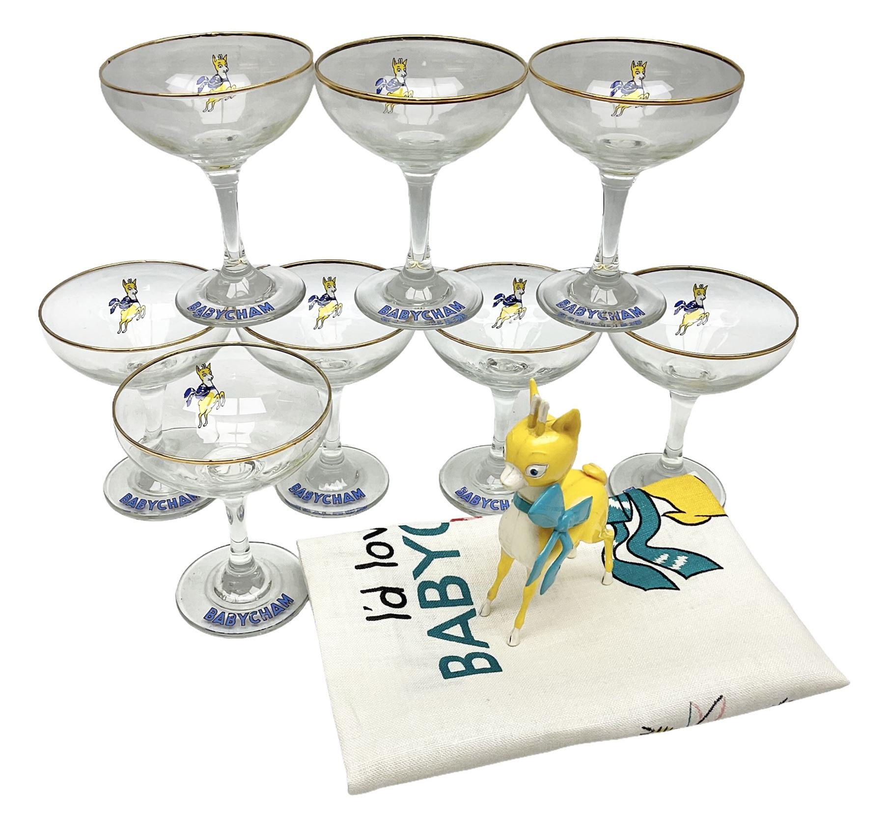 Breweriana; Eight Babycham glasses together with a Babycham plastic fawn mascot and linen I'd Love a Babycham tea towel