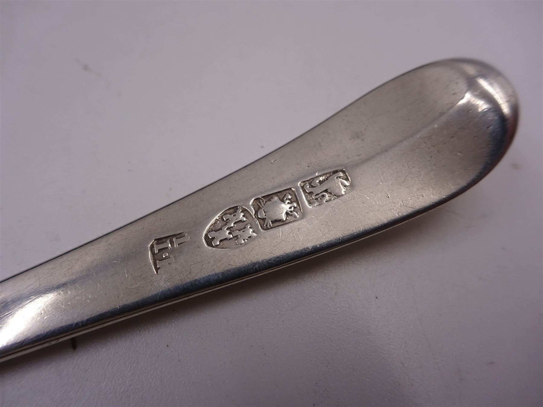 Collection of ten Newcastle silver teaspoons, comprising two Fiddle Shell pattern teaspoons, the first example hallmarked Reid & Sons, Newcastle 1859, and the second example hallmarked Thomas Sewell I, Newcastle 1856, together with four Fiddle pattern teaspoons and four Old English pattern teaspoons, with varying maker's including 	Thomas Wheatley and John Robertson II & John Walton, dated between 1821 and 1836 but most without date letters 