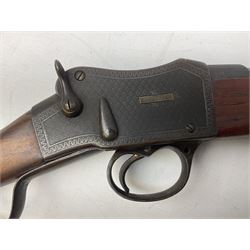 Manton .577/450 Martini Henry rifle, the 82.5cm smooth bored barrel proofed for shot, two barrel bands and bayonet fitting, engraved action with side safety, figured walnut stock with chequered steel butt plate, complete with ramrod, NVN other than 5346 on barrel, L125cm