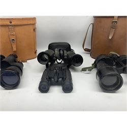 Pair of British World War Two issue black-painted binoculars, Bino 7x50 No. 5, 6E/320, No. 87412, MoD.B/42, with case, together with Nipole 10 x 50 binoculars and two other pairs