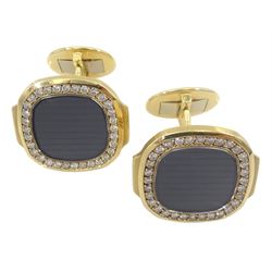 Pair of Patek Philippe Nautilus 18ct yellow gold and diamond cufflinks, with sapphire crystal, black-grey centre and diamond-set front, hallmarked, in original box