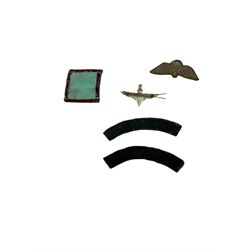 WWII Parachute Regiment insignias, comprising two shoulder titles, Pegasus formation badge, cloth wings and cap badge 