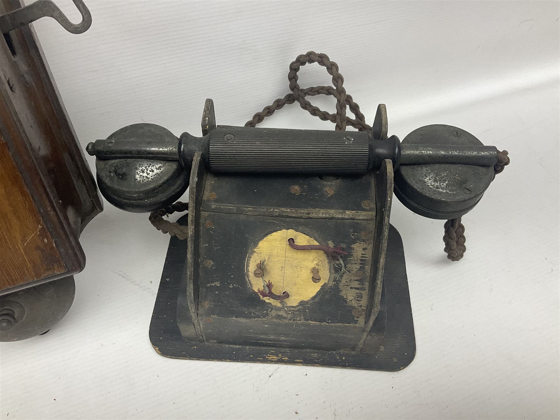 Collection of phone headsets, including GPO bakelite examples, together with other telephone parts 