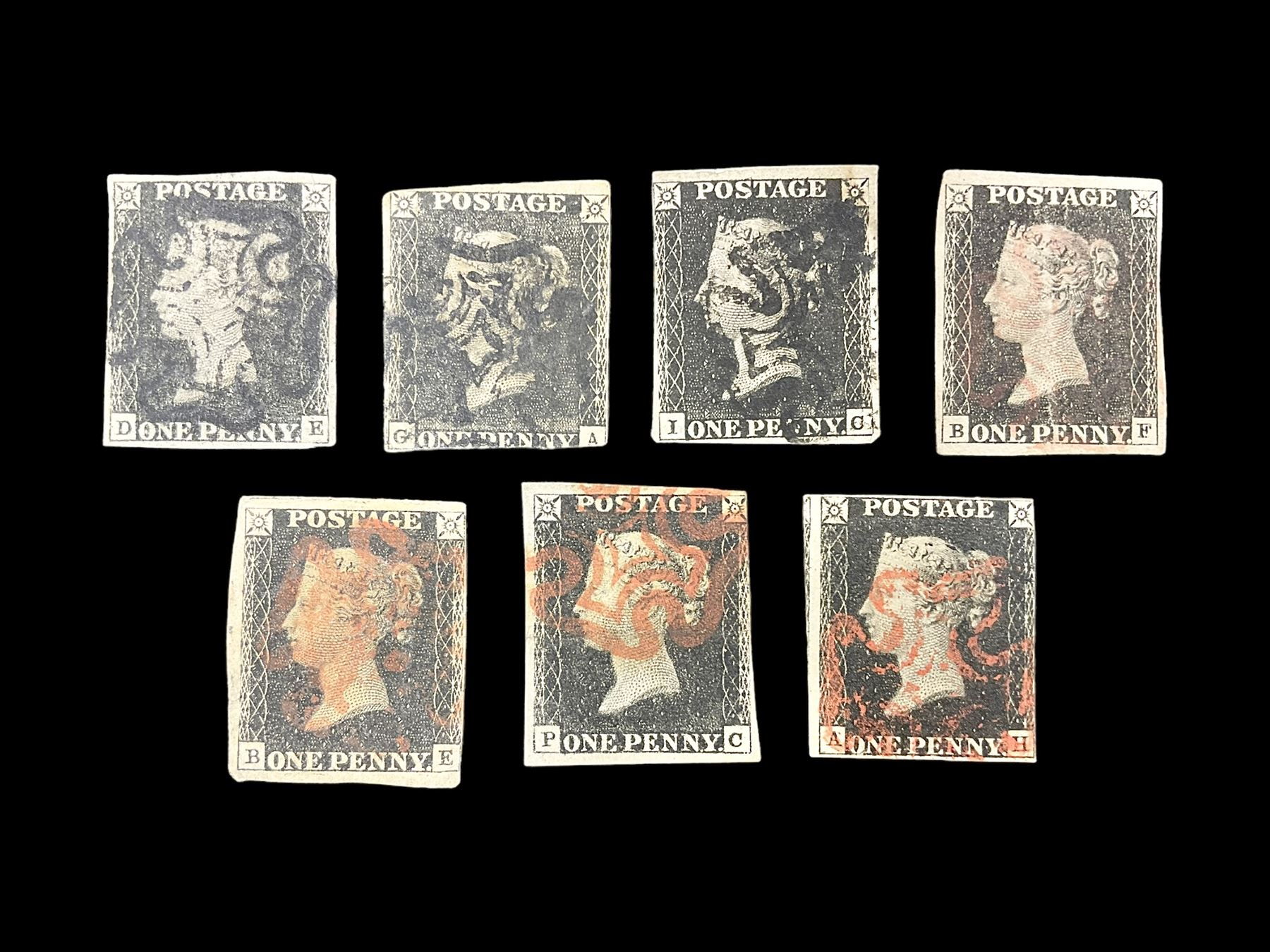 Seven Great Britain Queen Victoria penny black stamps, three with black and four with red MX cancels