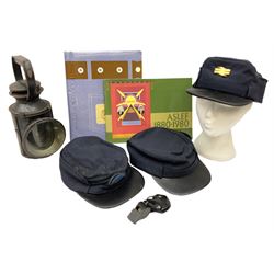 Black painted three colour railway lamp with revolving filters, H29cm; BR Acme Thunderer whistle; three railway peaked caps, two with BR Intercity 125 badge; small album of photographs of railway interest etc