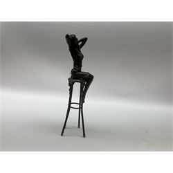 Art Deco style bronze modelled as a female figure seated upon a chair, after 'Pierre Collinet', H28cm