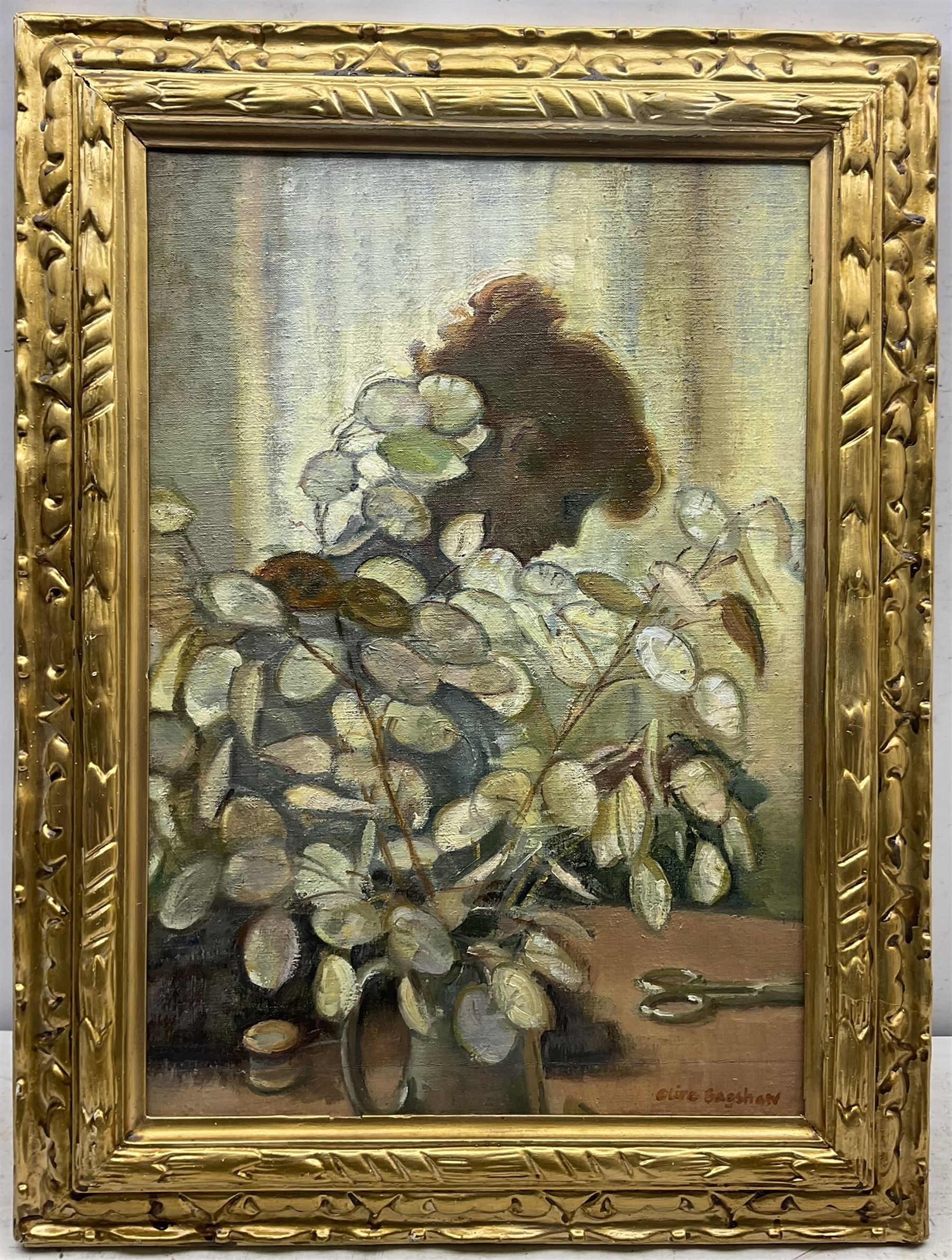 Olive Bagshaw (Northern British fl.1965-1978): Lady Reading behind a Jug of Dried Honesty, oil on canvas laid on board signed 53cm x 36cm 
Provenance: from the Artist's Studio Sale. Miss Bagshaw who was born in Salford, received her formal art training at Salford and Manchester Art School. Her work has been regularly accepted at the Royal Society of Portrait Painters, the Royal Academy and Federation of British Artists (Information from a 1970's Monks Hall Museum and Gallery exhibition catalogue).