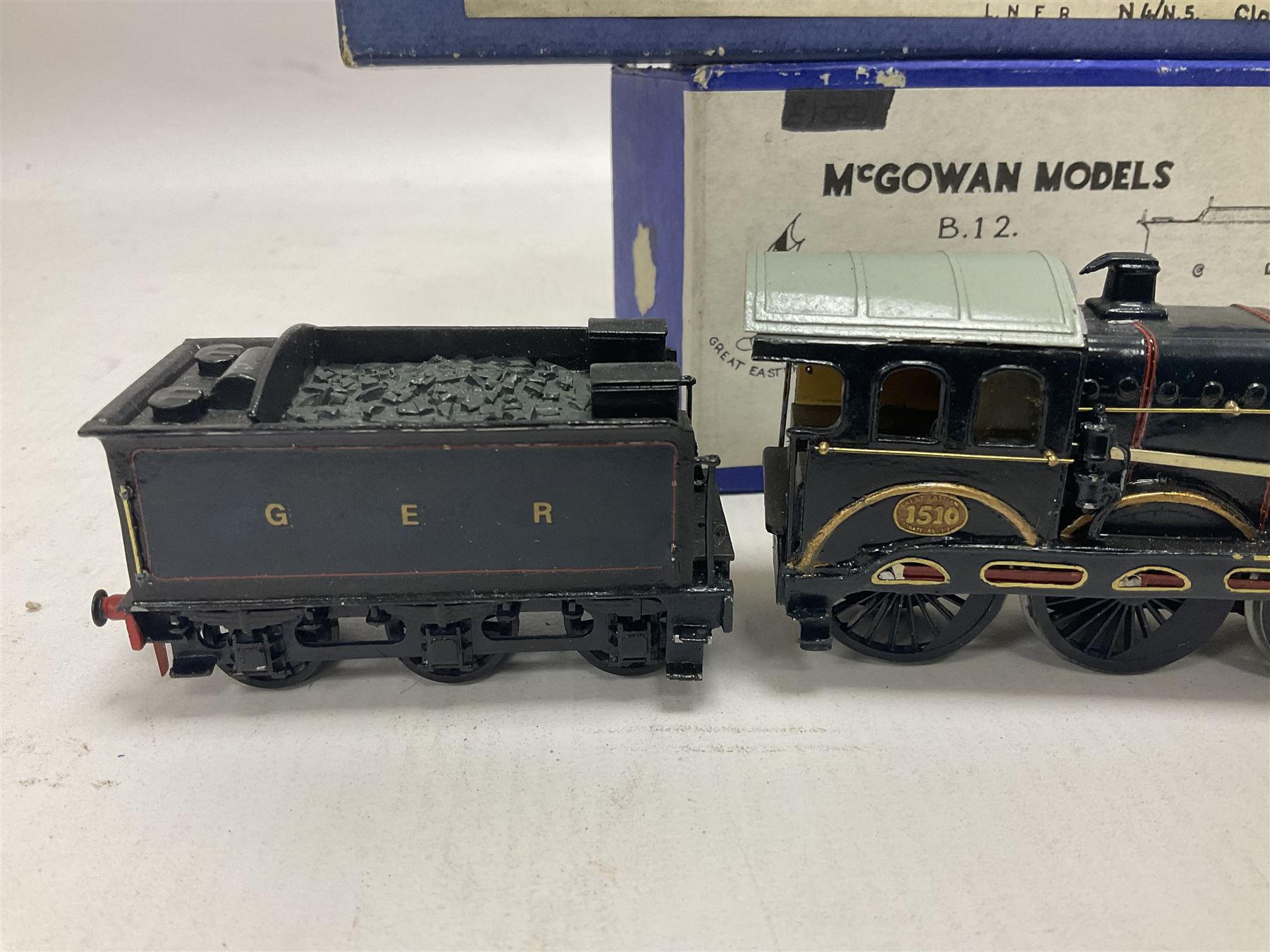 ‘00’ gauge - three kit built steam locomotives comprising GER Class S69/B12 4-6-0 no.1510 finished in GER blue, with McGowan Models box; Aspinall Class 1008 2-4-2T no.50887 finished in BR black, with McGowan Models box; MR/LMS Class 1P 0-4-4T no.1268 finished in LMS black with Craftsman Models box (3) 