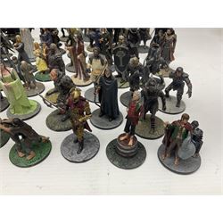 Approximately 80 NLP Lord of the Rings heavy metal painted figurines to include Fell Beast, boxed, and The Watcher, The Dark Lord Sauron, Treebeard etc, and unassociated Dracula themed composite figures marked HHFT50 