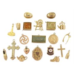 Twenty 9ct gold pendant / charms including cross, egg, wishbone, spinning wheel, shoe, money boxes and Yorkshire town sign and gold-plated locket pendant