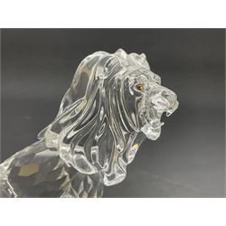 Swarovski Crystal animals, comprising camel and lion, both upon frosted crystal bases, together with Swarovski Crystal palm tree, upon similar frosted crystal base, tallest H14cm