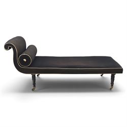 Victorian ebonised chaise longue, upholstered in black fabric with scroll headrest and bol...