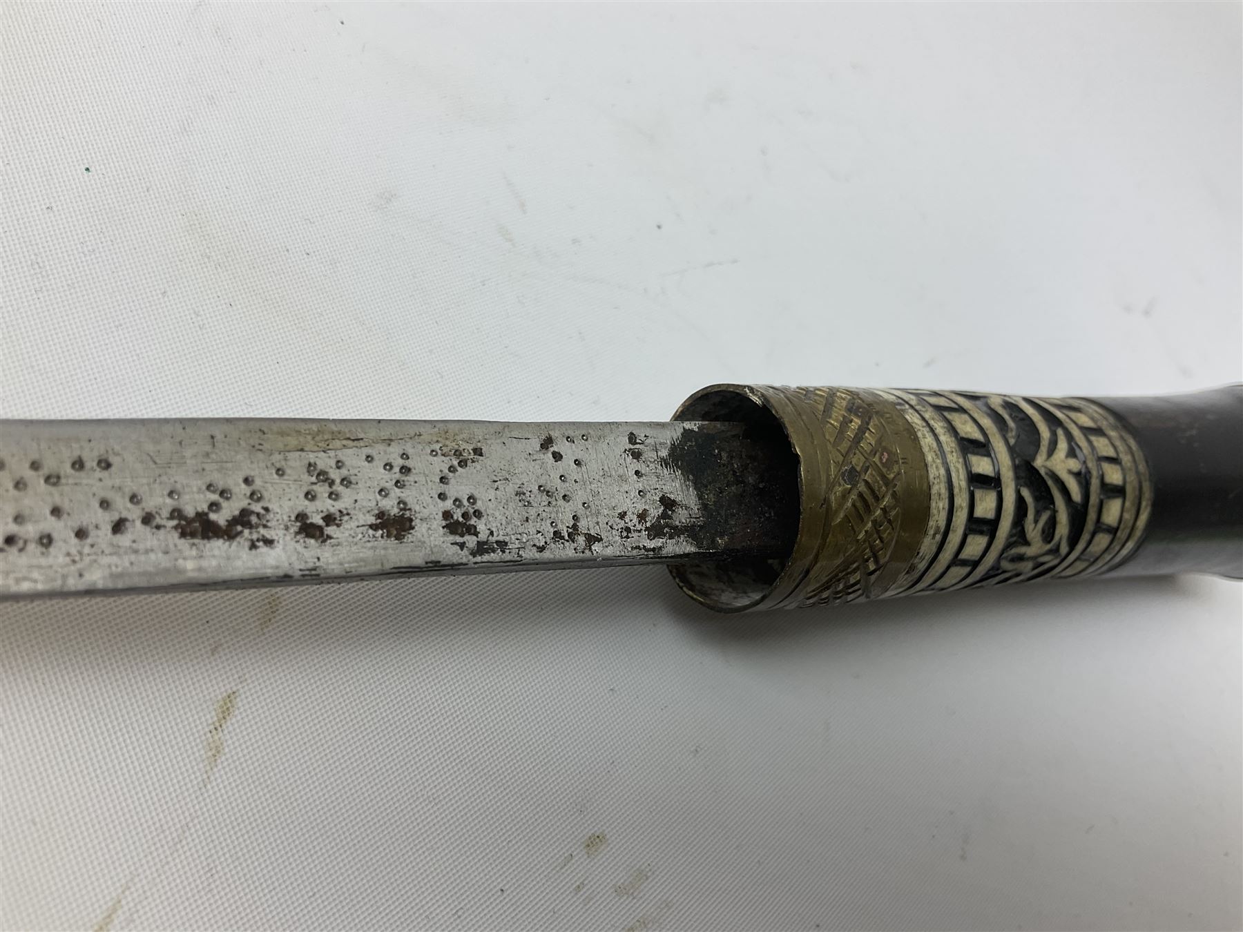 
Late 19th/early 20th century Anglo Indian ebony and bone sword stick with 62cm steel blade, brass locking ferrule and lion mask pommel L92 cm.