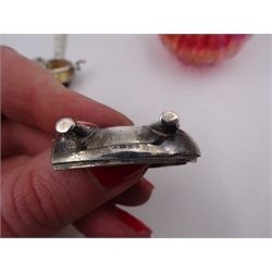 Modern novelty silver tape measure, in the form of a pig, hallmarked CME Jewellery Ltd, together with a silver mounted pink glass scent bottle, signed H. White to base, with silver collar hallmarked Laurence R Watson & Co, Birmingham 1996, scent bottle H12cm