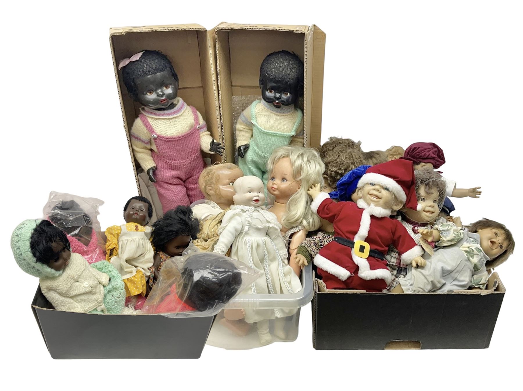 Quantity of vintage and later dolls to include unusual three faced example and further dolls marked C.J, Gloobee, Rosebud etc in three boxes