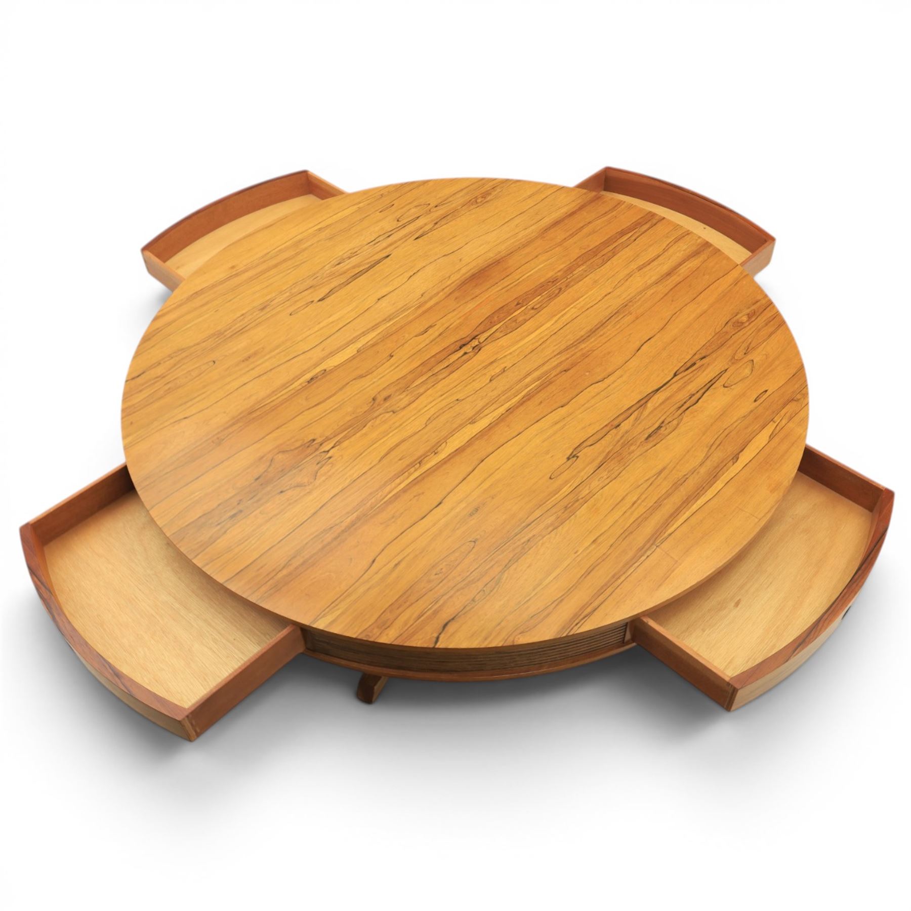 Robert Heritage for Archie Shine - mid-20th century santos rosewood drum table, circular top with four drawers with recessed handles, receded elements, raised on a cylindrical support with three legs