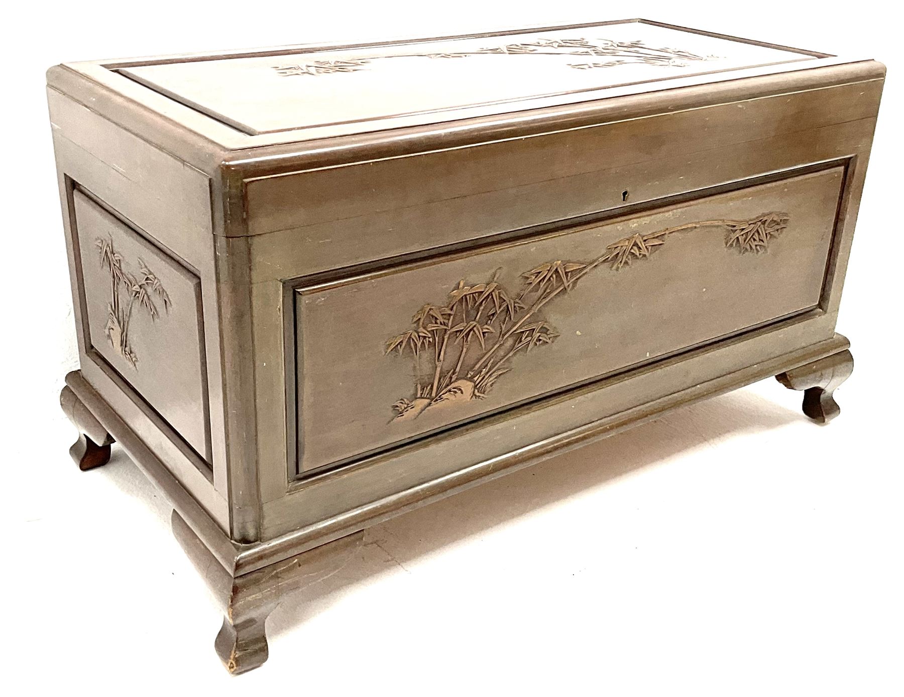 Chinese rosewood camphor wood blanket chest, bamboo carved detail, hinge lid, shaped bracket supports 