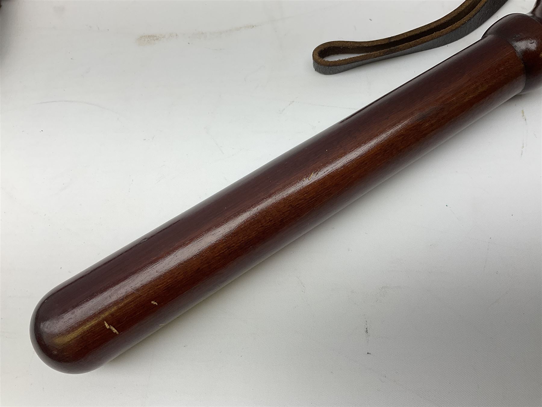 Three police turned hardwood truncheons comprising two patrol truncheons and WPC short truncheon (3)