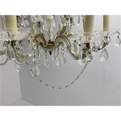 Victorian style glass eight branch chandelier, with drip trays, brass tone support, and drops