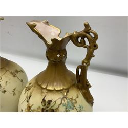 Pair of Turn Vienna blush ivory ewers decorated with floral sprays and gilt, H25cm